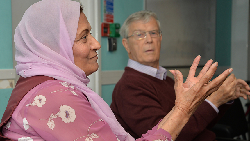 People with dementia interact during a drama group.