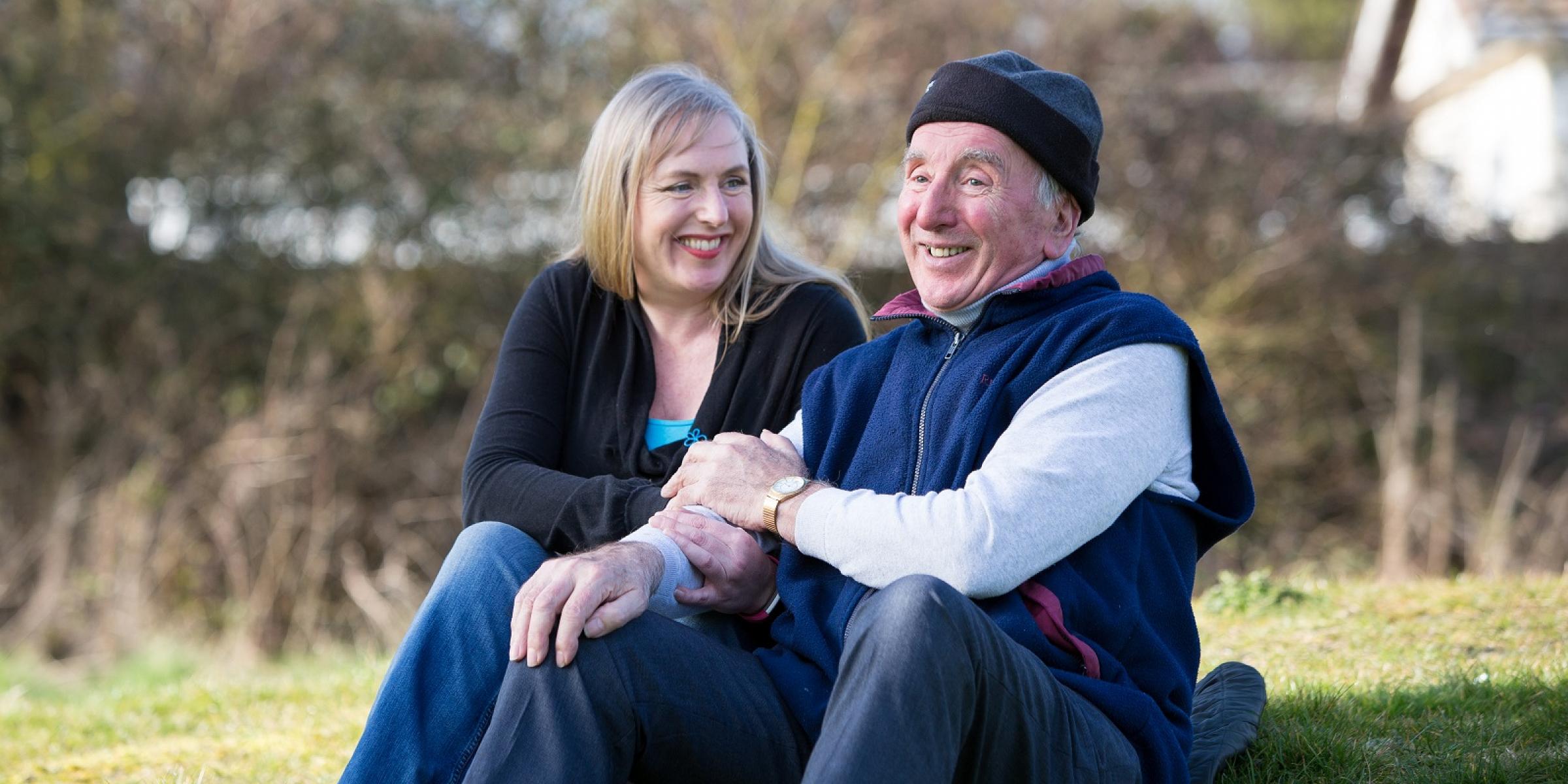 Couple sitting outside