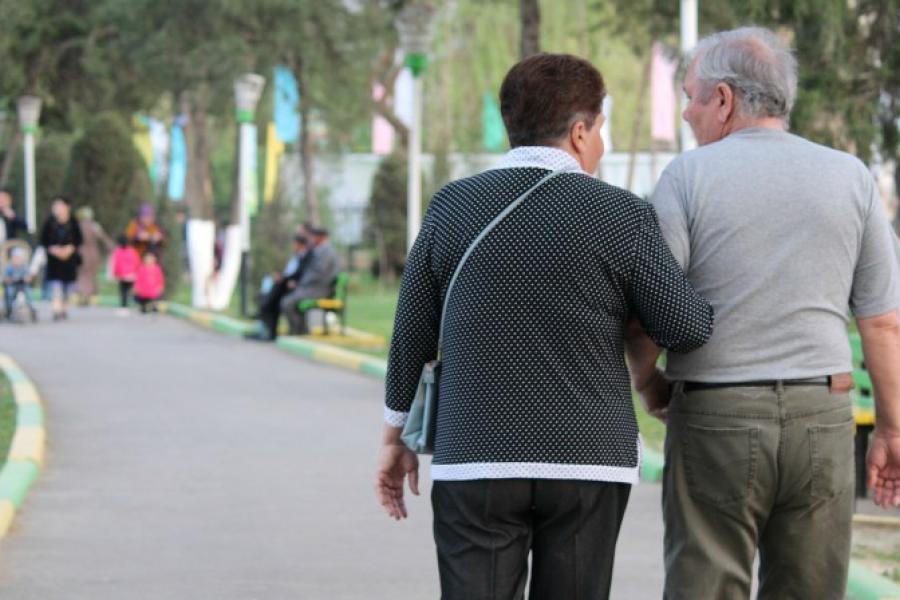 Older couple walking on a path