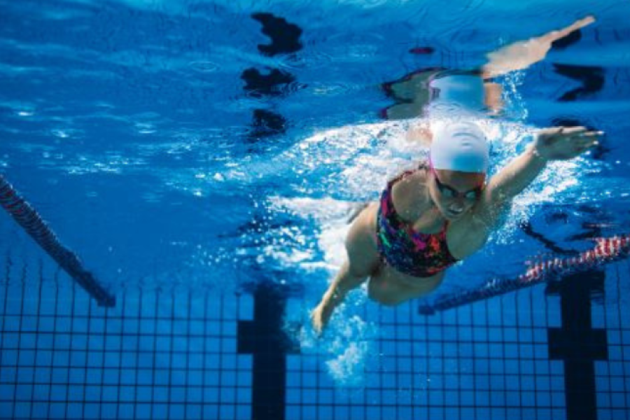 Woman swimming underwater