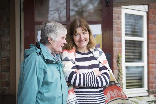 A woman with dementia and a volunteer