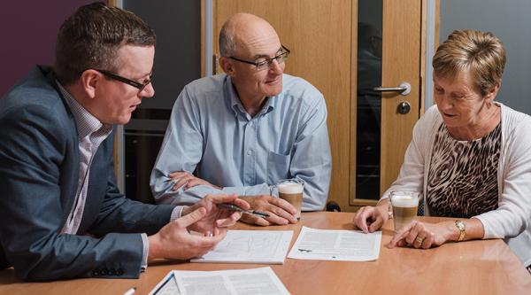 People consulting a solicitor