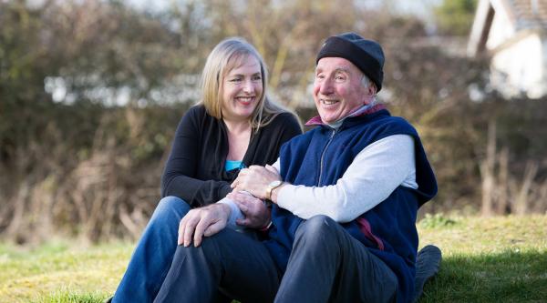 Couple sitting outside