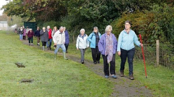 A Walking Group in a park