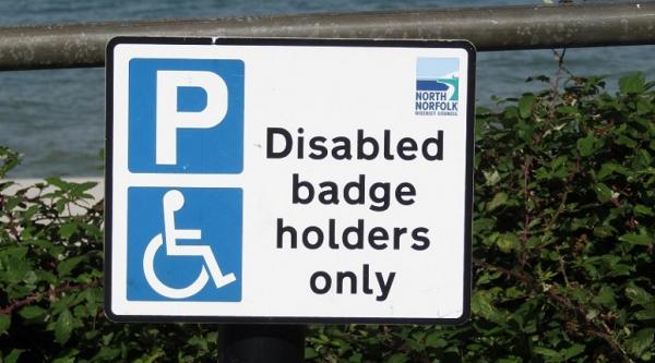 A blue badge parking sign