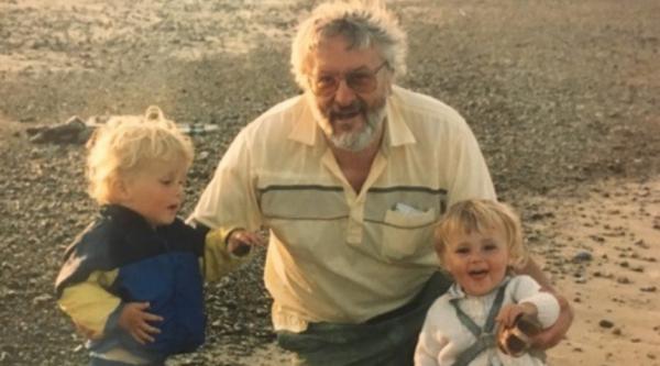 Family photo of a young Sarah with her dad