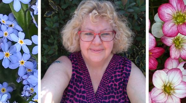 Tracey smiling in the garden