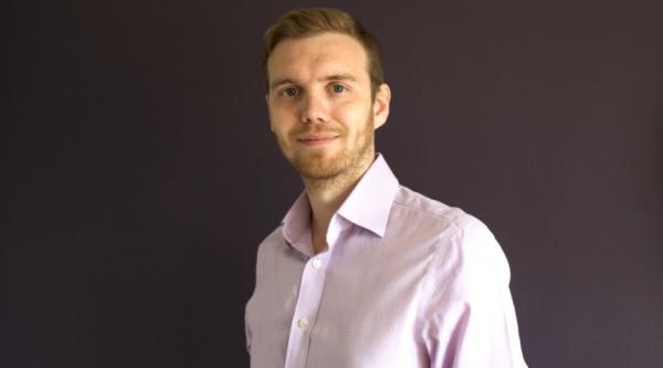 Ryan West, our dementia researcher, looking at the camera and smiling