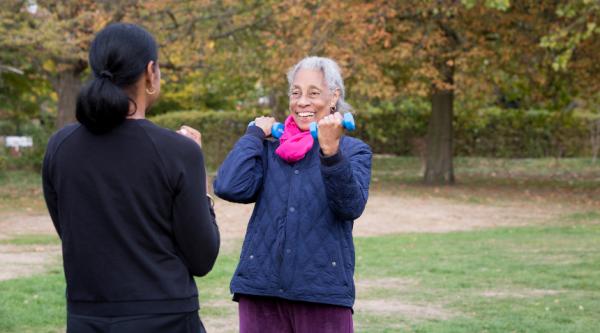 Daphne and Michelle women outside in a park enjoying light exercise
