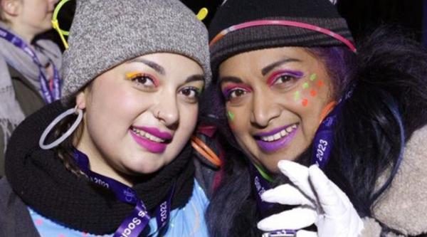 Genevieve Fernandes and a friend taking part in Glow Walk
