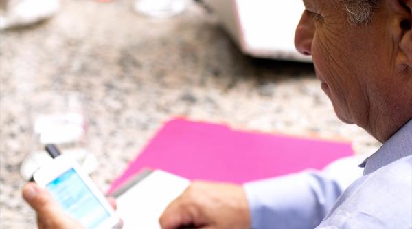 Man using an app on a device