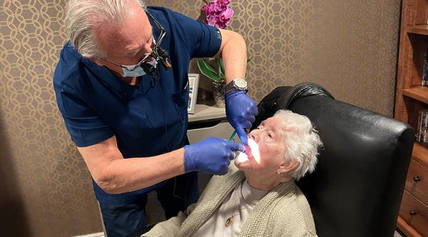 Older person having a dental exam