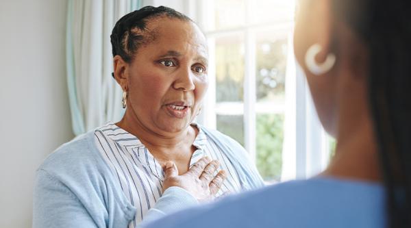 Woman talking from the heart with another person