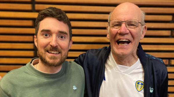 Mick Haith wearing his Leeds United shirt and stood next to playwright Chris O’Connor