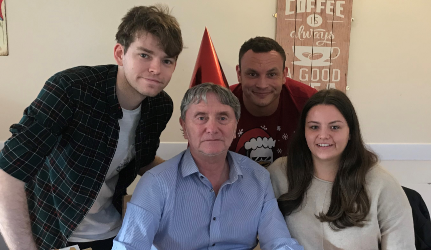 Jess Ford and her brothers sitting with their dad