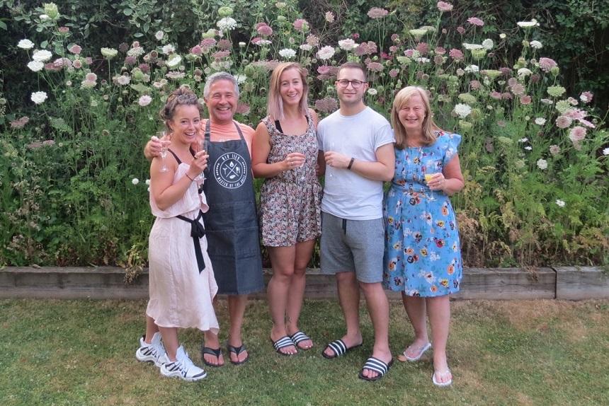 Trevor, Yvonne and family in the garden 