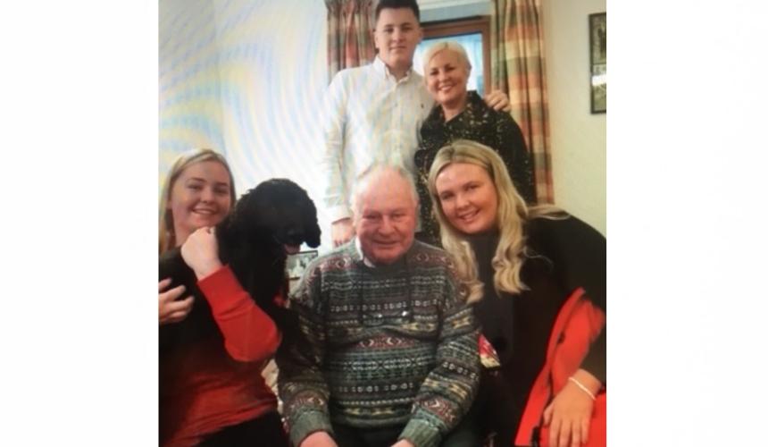 Sarah with her dad, Bill, as well as Max. Rosie, Molly, and Lottie the dog