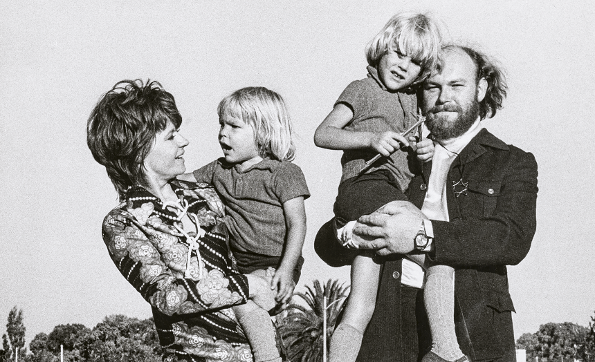 A black and white photo of Tim and Pru with Sam and Joe