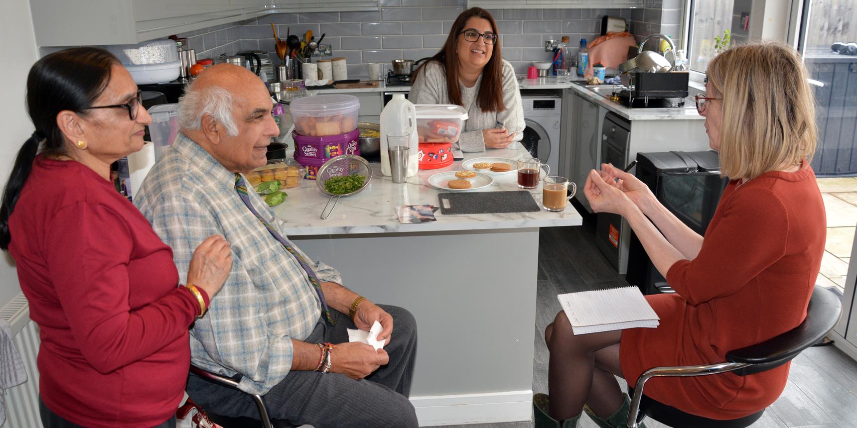 Dinesh Gohil and family being interviewed at their home