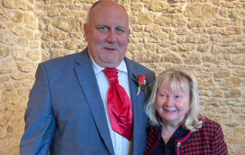 Steve stands next to his wife Leigh