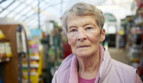 A woman at a garden centre