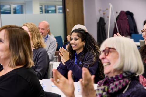 Dementia Friends clapping at an organisation's event